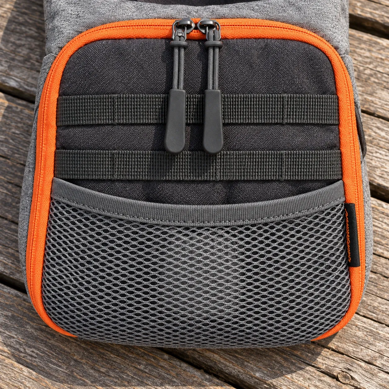 Cedric Fly Fishing Chest Pack - Gray / Orange — closed front pocket zippers, webbing and mesh
