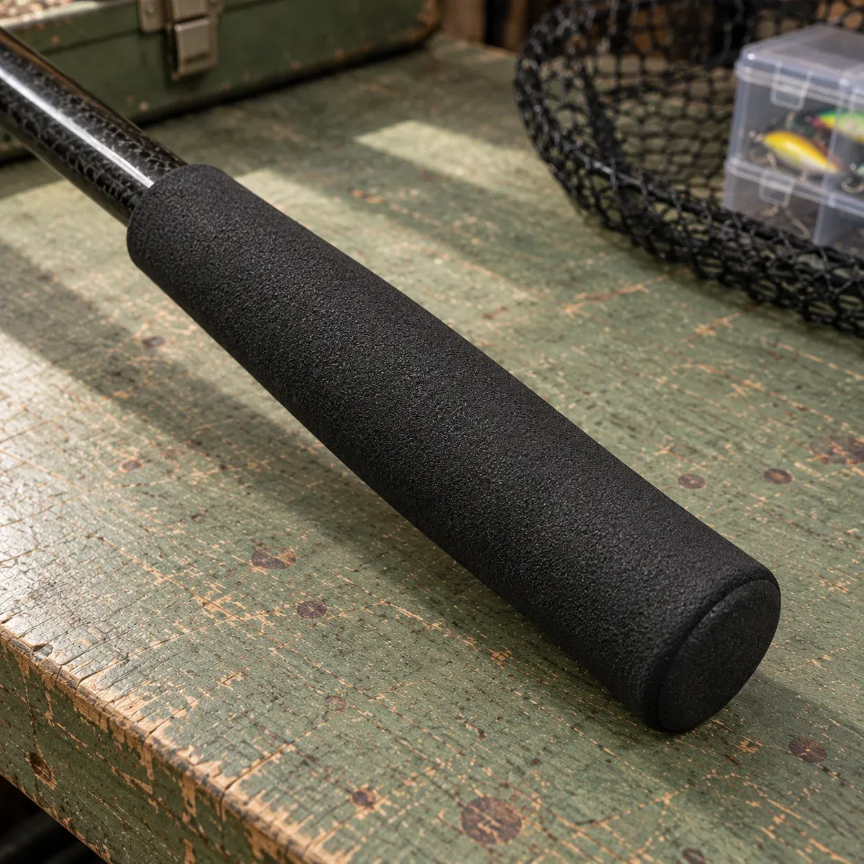 Foam handle grip of the black landing net