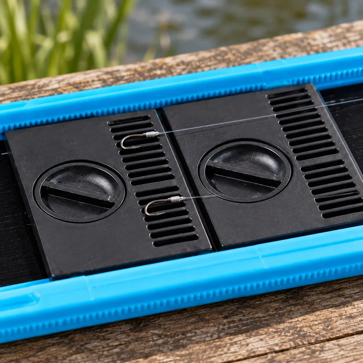 Owen Hooklength Box — Blue / 380 — hooks seated in storage grooves; props excluded